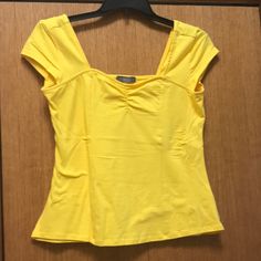 Yellow Tank Top Type Shirt With Small Gathers In Middle On Front Ordered Online Never Worn Too Tight Fits More Like A Large Or Medium Yellow Stretch V-neck Top, Yellow Stretch V-neck Blouse, Casual V-neck Fitted Blouse, Yellow Stretch Blouse For Day Out, Casual Stretch Yellow Blouse, Yellow Tank, Yellow Tank Top, Order Online, Tights