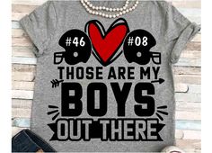 a t - shirt that says those are my boys out there with two hearts on it