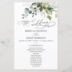 an elegant wedding program with greenery on it