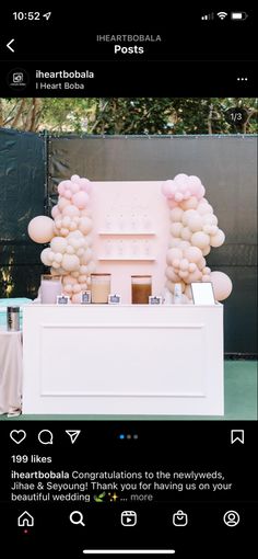 an image of a table with balloons on it and a sign that says i love you