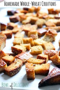 there are many pieces of bread on the tray