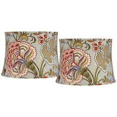 two lampshades with floral designs on them