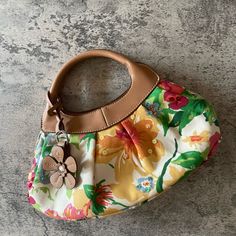 New Without Tags. Relic Tropical Floral Handbag With Sequin And Cute Floral Embellished. 12” X 9” X 3”. 38” Removable Strap. Linen And Faux Leather. Adorable Bag That’s Perfectly For Vacation Or Spring. Unused. Has A Very Small Mark On Interior Lining. Yellow Satchel For Everyday Spring Use, Yellow Satchel For Spring, Yellow Floral Print Shoulder Bag For Daily Use, Yellow Everyday Satchel For Spring, Vintage Yellow Bag For Spring, Vintage Yellow Bags For Spring, Floral Handbags, Floral Purse, Floral Bags