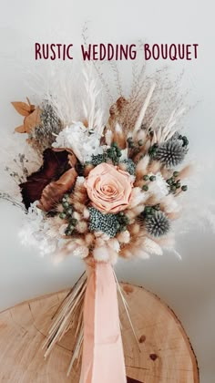 a bouquet of flowers sitting on top of a wooden table