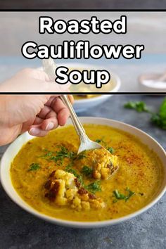 roasted cauliflower soup in a white bowl with a hand holding a ladle