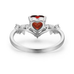 Cue the romance with our stunning Heart’s Desire Red Garnet Ring. This perfect expression of true love features a heart-shaped red garnet center stone along with a curved leafy band that adds a natural charm. A cherished keepsake that radiates love from every angle. ✦ Available in both 14K white gold vermeil (14K white gold plated over a sterling silver base) and 10K solid white gold. Red Heart Ring With Center Stone, Red Heart-shaped Rings With Center Stone, Red Garnet Rings For Valentine's Day, Red Heart Shaped Rings With Accent Stones, Red Heart-shaped Rings With Accent Stones, Elegant Red Heart Promise Ring, Red Heart Ring With Accent Stones For Promise, Red Heart Ring With Center Stone For Wedding, Red Heart Ring With Accent Stones For Anniversary