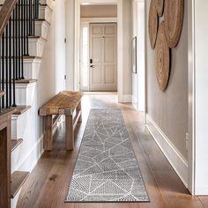 the hallway is clean and ready for us to use as an entrance way in this home