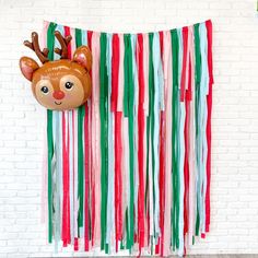 Transform your holiday celebrations with our Holiday Fringe Backdrop - the perfect addition to any festive gathering! Whether you're hosting an intimate family gathering or a large corporate event, this Classic Christmas Fringe Backdrop adds a touch of festive charm to any setting. Its weather-resistant properties ensure it looks great throughout the season, come rain or shine. The shimmering fringe creates a magical, winter wonderland effect, instantly elevating your holiday ambiance. Colors: red, green, pink, light blue and silver foil fringe Seven sizes to choose from:  backdrop is approximately 7' in height and 4', 5', 6', 7' 8' or 10' wide with extra rope on each side.  Our backdrops are weather-resistant, light-weight, and reusable for indoor and outdoor use. Easy to hang: You just n Christmas Fringe Backdrop, Holiday Party Backdrop, Streamer Backdrop, Backdrop Christmas, Christmas Backdrop, Fringe Backdrops, Home Themes, Magical Winter, Christmas Balloons