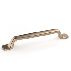 an antique brass cabinet handle on a white background