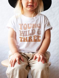 ✿✿ Young, wild, & three! This toddler tee is perfect for your wild one's 3rd birthday party. ✿✿ Matching Mama & Daddy shirts here: https://www.etsy.com/listing/1242460490/ ✦ 100% Soft cotton (fiber content may vary for different colors) ✦ Gildan Soft Style or Bella Canvas brand, varies based upon availability ✦ Unisex clothing, fits true to size LOOKING FOR A DIFFERENT SIZE OR COLOR? Message me! CARE INSTRUCTIONS -- Machine wash: warm or cold -- For best results, air dry. Otherwise tumble dry: l Two Groovy Birthday, Mommy And Me Shirt, Mia 3, Birthday Party Shirt, Toddler Birthday