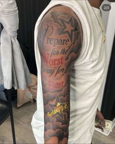 a man with a tattoo on his arm that says prepare for the worst day ever