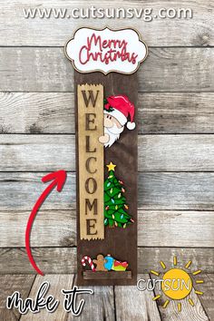 a wooden sign that says merry christmas with a santa clause on it and the words welcome