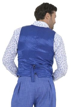 Argentine Tango dance vest, Men's denim blue vest, Waistcoat with paisley print satin back, Men's Latin show gilet, Salsa performance vest Denim Blue Tango Vest With Paisley Print Satin Back Elevate your wardrobe with our Denim Blue Tango Vest, a perfect blend of simplicity and sophistication designed for the modern man. This vest features a striking paisley print satin back that adds a touch of elegance and individuality to any outfit.  Pair it with our matching Men's Pants With Front And Back Slim Fit Sleeveless Vest For Spring, Fitted Sleeveless Denim Vest With Pockets, Spring Slim Fit Sleeveless Vest, Fitted Cotton Denim Vest With Pockets, Slim Fit Sleeveless Winter Vest, Winter Slim Fit Sleeveless Vest, Fitted Sleeveless Vest With Pockets, Elegant Slim Fit Vest For Spring, Fitted Blue Cotton Denim Vest