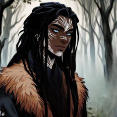 a man with dreadlocks standing in the woods