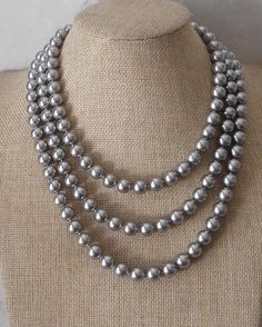 PREFERENTIAL POLICIES : The order is $20 or more.There will be a 10% discount.long-term effective. Please use the coupon code: CZH10 Welcome back to my shop: https://www.etsy.com/shop/pearlandjewelry Description of the product in the picture: The necklace lengh is 60 inches ,I make the necklace to use 10mm gray glass pearls, The pearls are individually hand knotted . IT is good necklace for your great wedding, The picture color is gray. Can choose other colors are:ivory,white,light pink,Black, r Gray Pearl Jewelry For Party, Formal Gray Pearl Necklace, Gray Pearl Necklace For Formal Occasions, Elegant Gray Necklace For Wedding, Bride Pearl Necklace, Bridesmaid Pearl Necklace, Gray Pearl Necklace, Ivory Pearl Necklace, Temple Jewellery Earrings