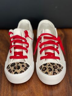 These are adorable leopard print bedazzled sneakers! Perfect for school spirit or just leopard lovers! Casual Sneakers With Rhinestones For Streetwear, Casual Sneakers With Rhinestones And Round Toe, Casual Low-top Sneakers With Rhinestones, Casual Lace-up Sneakers With Glitter Accents, Casual Glitter Accents Lace-up Sneakers, Casual Glitter Lace-up Sneakers, Painted High Tops, Bedazzled Sneakers, Diy Leopard Print