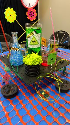 a table with some science themed items on it