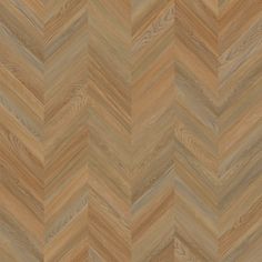 an image of wood flooring that looks like chevroned herringbones in light brown