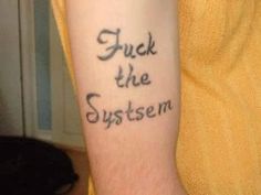 a person with a tattoo on their arm that says, back the system tattoos fail