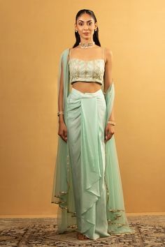 Ice blue blouse with gota work embroidery. Paired with draped dhoti skirt and cape. - Aza Fashions Fitted Pista Green Pre-draped Saree For Eid, Traditional Fitted Draped Sets, Fitted Festive Sets With Side Open Design, Fitted Draped Sets For Navratri, Fitted Pista Green Pre-draped Saree For Navratri, Traditional Fitted Set With Side Open Design, Traditional Fitted Sets With Side Open, Blue Blouse, Embroidered Blouse