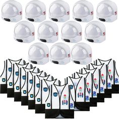 10 pairs of white hard hats with different designs on the front and side, all lined up