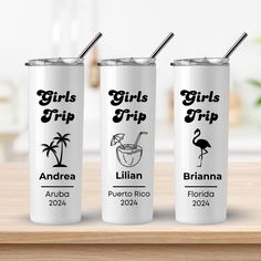 three personalized tumblers with the names girls trip and an ibana on them