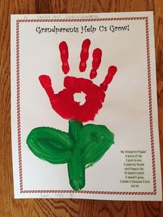 a handprint with the words grandparents help us grow on it and a red flower