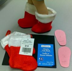 a pair of red and white slippers next to an advertiser's price tag