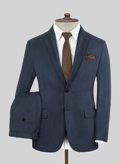 Radiate an aura of poise and grace on every occasion with our exquisite Scabal Nim Herringbone Blue Wool Suit. Tailored using the finest wool fibers, this suit boasts a serene blue color scheme with a herringbone design that seamlessly enhances your office wear collection as well. Elevate your sartorial prowess with this timeless ensemble that is bound to leave a lasting impression! 
  Look Includes     Scabal Nim Herringbone Blue Wool  Fabric  Two Button Jacket Style  Notch Lapel   Horn Royal B Sharkskin Suit, Grey Wool Suit, Flannel Suit, Tailored Suit, Herringbone Tweed, Grey Tweed, Tweed Suits, Silk Suit, Linen Suit