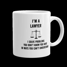 a white coffee mug with the words i'm a lawer and an image of scales