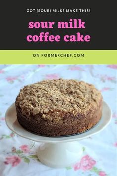 a cake sitting on top of a white plate with the words sour milk coffee cake