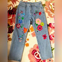 Adorable Floral Painted Jeans. 30” Inseam. Waist Measures 16” Across. New Without Tags. Blue Relaxed Fit Jeans With Floral Embroidery, Blue Jeans With Floral Embroidery, Relaxed Fit, Blue Floral Embroidery Relaxed Fit Jeans, Pink Floral Print Jeans For Summer, Casual Multicolor Floral Embroidered Bottoms, Casual Multicolor Floral Embroidery Bottoms, Multicolor Floral Print Jeans For Spring, Multicolor Floral Embroidered Bottoms For Spring, Spring Multicolor Floral Embroidered Bottoms