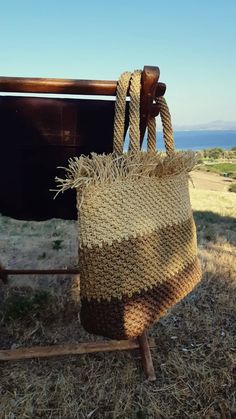 Paper rope straw bag is an ultimate summer bag. It can keep a lot of little things that no woman can do without.  Can be used like beach bag, market shopping bag, daily and holiday bag. High quality great handmade gift for any occasion and for women any age. more crochet bag here https://etsy.me/3mXZ93a Dimentions: height 12`` (30 cm) length 1845 cm) depth 4`` (11 cm) Small pocket inside This crochet tote bag is smooth, strong, soft, breathable, hypo-allergenic, does not gather dust or dirt - lightweight, does not wrinkle, easy to wash Paper raffia (natural cellulose) yarn is tolerate well humid conditions and, due to the tight crochet, it does not ignite easily. CARE: hand washable in cold water 30 C. Dry flat. Special designs can be created by combining different colors according to the Eco-friendly Macrame Straw Bag For Vacation, Eco-friendly Macrame Straw Bag For Summer, Braided Jute Beach Bag In Natural Color, Natural Jute Braided Beach Bag, Natural Braided Jute Beach Bag, Bohemian Straw Bag With Fringe For Beach, Bohemian Fringe Straw Bag For Beach Season, Natural Color Beach Bag With Tassels, Eco-friendly Macrame Beach Bag