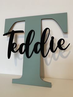 the letters f and f are made out of black paper, which reads faddle