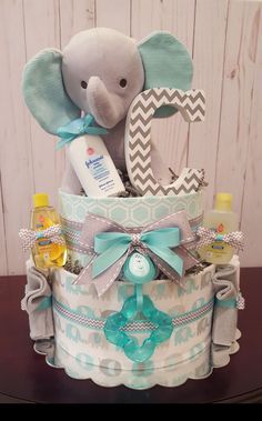 a diaper cake with an elephant on top