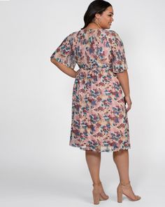 Knee-length Floral Print Midi Dress For Garden Party, Feminine Mid-length Floral Dress, Feminine Multicolor Floral Print Midi Dress, Feminine Midi Dress With Floral Print, Feminine Multicolor Floral Midi Dress, Mid-length Floral Print Dress For Garden Party, Feminine Multicolor Knee-length Floral Dress, Mid-length Ditsy Floral Dress For Garden Party, Flowy Knee-length Floral Dress For Garden Party