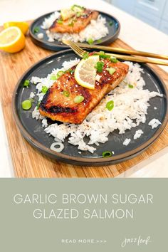 garlic brown sugar glazed salmon served on rice with lemon wedges