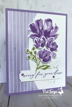 a card with purple flowers on it