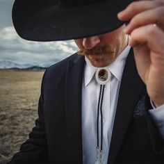 Wild Horse Bolo Tie | Montana Silversmiths Western Groom Attire Bolo Tie, Navy Suit Bolo Tie, Luxury Handmade Bolo Ties As Gift, Bolo Tie Men Wedding, Bolo Tie Groomsmen, Bolo Tie Wedding Groom, Bolo Tie Outfit Mens, Bolo Tie Aesthetic, Adjustable Western Bolo Tie For Formal Occasions