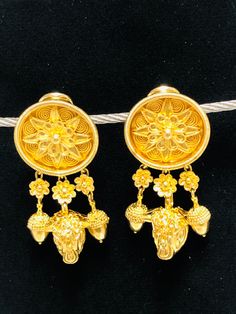 Vintage a striking pair of disc and fringe earrings by LaLaounis from the classical and Hellenistic collection ,Circa 1960's the earrings designed as a highly ornates a highly ornate disc decorated with extensive twisted wirework in floral ,star and spiral motifs with three articulated fringe drops all suspending a floral motif and the with a bull's head to the central drop and an acorn to each side ,with post and clip fittings. Maker: ILIAS LALAOUNIS/ Period: Circa 1960 / Origin: Greece./ 18k y Traditional Clip-on Earrings For Evening, Traditional Evening Clip-on Earrings, Mens Sterling Silver Necklace, Tiffany Necklace, Sterling Silver Heart Necklace, Gold Clips, Silver Heart Necklace, Oct 11, Fringe Earrings