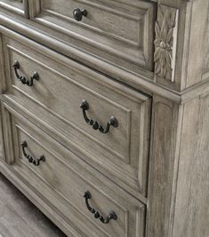 an antique dresser with handles and knobs on it's drawers is shown in this image