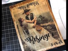 a wooden sign that says mr and mrs, with a photo of a couple on it