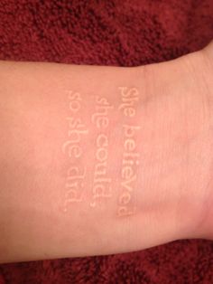 a person's arm with the words on it that are written in cursive writing