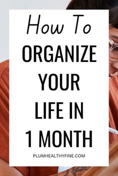 a woman with glasses is looking at her phone and has the words how to organize your life in 1 month