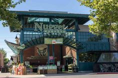 the entrance to nuggett's deli is shown in this photo, with an awning over it