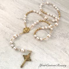 YourCustomRosary can make the bridal rosary of your dreams! Customize and personalize the way you want. Visit us on Etsy for any orders or inquiries. ❤️ #bride #catholic #bridalrosary #bouquet #wedding #planning #etsy #engaged #fiance #giftideas #swarovski #pearls #gold Spiritual Wedding Jewelry With 8mm Beads, Spiritual 8mm Beads Jewelry For Wedding, Elegant Beaded Wedding Rosary, White Spiritual Rosary For Anniversary, White 8mm Beads Wedding Rosary, Personalized Rosary With Round Beads For Wedding, White Wedding Rosary With 8mm Beads, Personalized Wedding Rosary With Round Beads, Spiritual Gold Rosary For Wedding