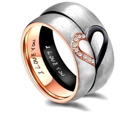 two tone gold and silver wedding ring with an open heart in the center, surrounded by diamonds