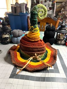 a crocheted hat sitting on top of a table