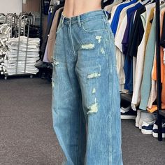 Product information: Style: Casual/Street/Vintage/Preppy/Punk/Hip Pop Main material: cotton Pant length: Trousers Waist type: mid-waist Thickness: Medium Popular element: buttons Color: Picture color Pant shape: straight legDescription:Elevate your denim game with our Vintage Washed Ripped Boyfriend Jeans. These jeans effortlessly blend casual. street. vintage. preppy. punk. and hip-hop styles. making them a versatile addition to your wardrobe. Crafted from high-quality cotton. they offer both s Grunge Style Wide Leg Cotton Pants, Grunge Wide Leg Cotton Pants, Non-stretch Grunge Cotton Pants, Vintage Non-stretch Bottoms With Pockets, Y2k Distressed Pants For Spring, Y2k Style Distressed Pants For Spring, Spring Grunge Wide Leg Bottoms, Y2k Distressed Cotton Bottoms, Y2k Style Distressed Cotton Bottoms