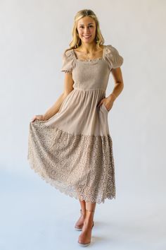 Turn heads in the unique and playful Hollberg Crochet Hemmed Midi Dress in Stone. This midi dress features crochet detailing along the hem for a touch of whimsy, while the stone color adds a chic and sophisticated touch. Perfect for any occasion, this dress is sure to become a staple in your wardrobe. Details self/lining: 100% polyester Fabric Care Guide Here Sizing & Fit Measurements are approximate and taken while laying flat across the front. Not doubled. small: bust = "; waist = "; length = Beige Midi Dress With Lace Patchwork, Beige Midi Dress With Lace Trim For Garden Party, Beige Lace Trim Midi Dress For Garden Party, Fitted Midi Length Dress With Crochet Trim, Fitted Midi Dress With Crochet Trim, Cream Midi Dress With Lace Trim For Garden Party, Spring Crochet Dress With Lace Trim For Garden Party, Beige Short Sleeve Crochet Dress For Spring, Cream Midi Dress With Lace Trim For Day Out